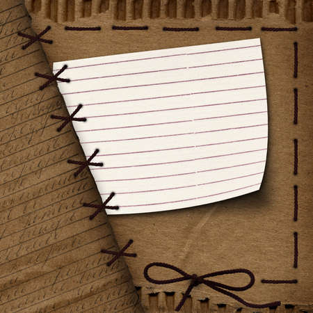 Old cardboard background for design with ropeの写真素材