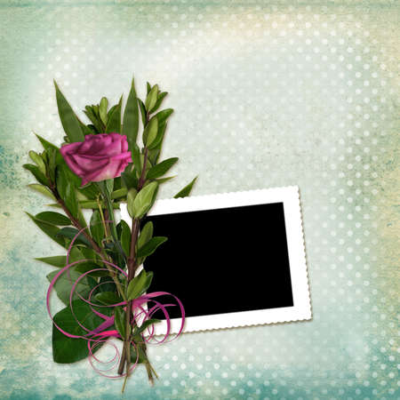 Frame with bouquet on old grunge background
の写真素材