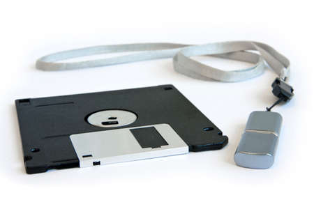 flash and diskette on white backgroundの写真素材
