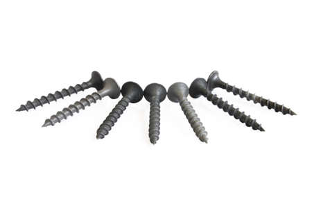 seven screws isolated on white backgroundの写真素材