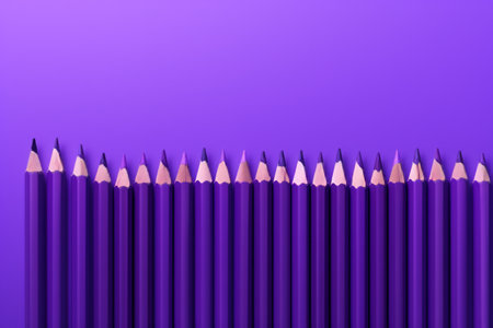 Leadership concept, group of pencils in row on purple backgroundの素材