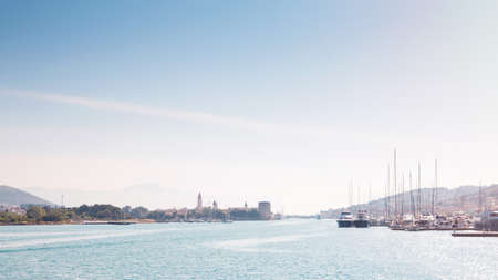 Panoramic photo of the old town Trogir and Ciovo island with harbor. Summer vacation. Travel destination. 16x9の写真素材