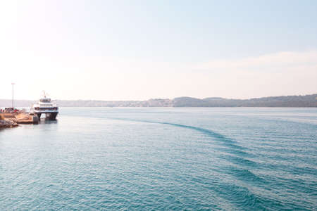 Croatia. Beautiful View at town Okrug Gornji from boat in the Adrian sea at sunny summer morningの写真素材