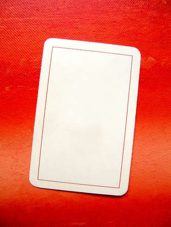 Blank card on red painted background : add your text :)の写真素材