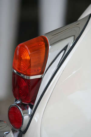 Retro automobile red and ornage lightsの写真素材