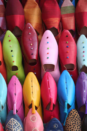 Colorful aligned shoes in arabic shopの写真素材