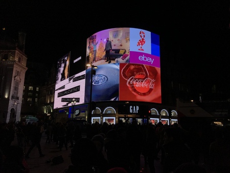 London, England - December 2017: Night in Piccadilly Circus square in the center of London, meeting place and surrounded by the main shopping streetsのeditorial素材
