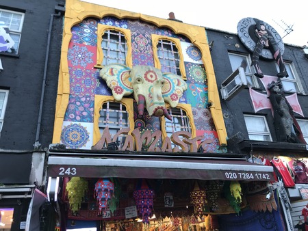 London, England - December 2017: Main facade of typical shoe and cloth shops in the famous Camden Town market. This market is well known for the large number of extravagant stores that existのeditorial素材