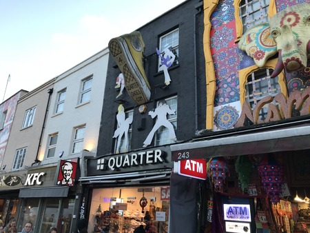 London, England - December 2017: Main facade of typical shoe and cloth shops in the famous Camden Town market. This market is well known for the large number of extravagant stores that existのeditorial素材