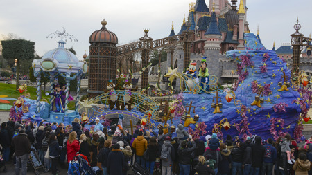 FRANCE, PARIS - February 28, 2016 - Parade of Disney characters with music and dance throughout the tour in Disneyland Park, Parisのeditorial素材