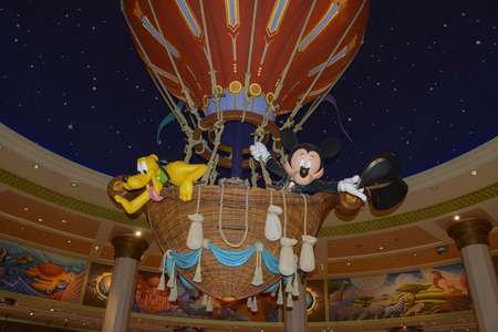FRANCE, PARIS - February 28.2016 - The famous Mickey mouse with his dog Pluto, mounted in a hot air balloon into a souvenir shop, in the park of Disneyland Parisのeditorial素材