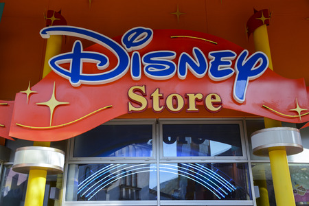 FRANCE, PARIS - February 27, 2016 - Poster of the Disney stores in the Disney Village area. Place to buy souvenirs, toys and clothes from our trip to Disneyland Paris.のeditorial素材