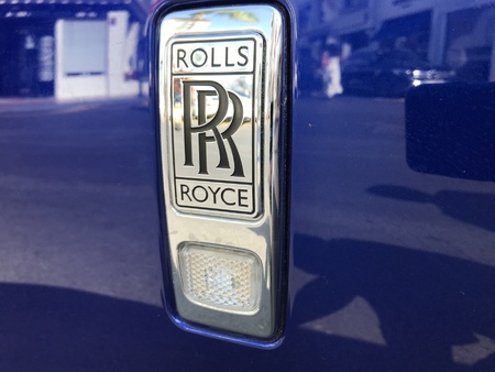 Marbella, Spain - August 10, 2018: Logo of a Rolls Royce car parked inside the famous Puerto Banus. Luxury port where you can take a walk, have a drink and see large and luxurious yachtsのeditorial素材