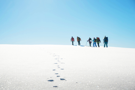 hiking in winter mountains. People travel and sport conceptの写真素材