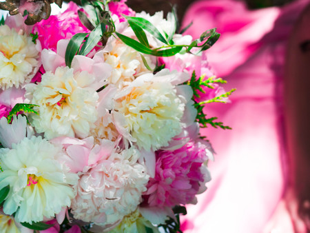 Beautiful bright bouquet of white and pink peonyの写真素材