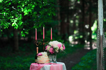 beautiful wedding decorations champagne flowers and cakeの写真素材