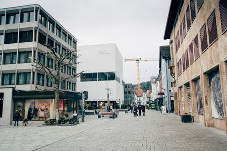 Vaduz, Liechtenstein -January 27, 2017: The central street of the city with typical buildings,...
