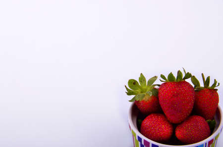 Strawberries in a bowlの写真素材