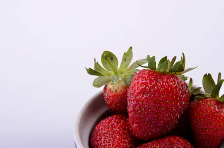 Strawberries in a bowlの写真素材