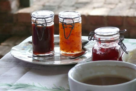 Jams and marmalade with coffeeの写真素材