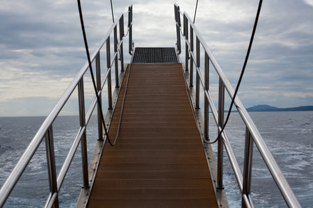 Staircase on the deck of a ferry boat in the seaの写真素材