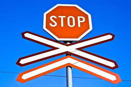 Stop sign with a clear blue skyの写真素材