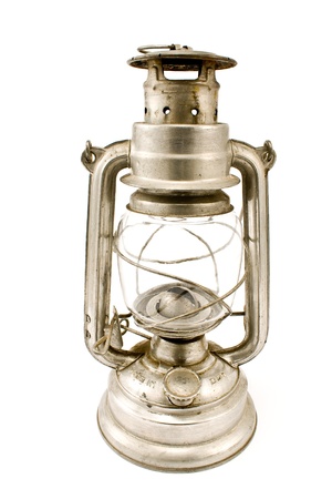 Old oil lamp isolated on whiteの写真素材