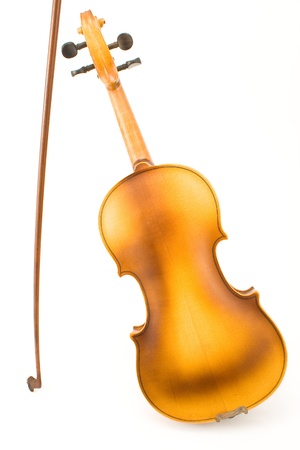 Backside body of old violin with bow isolated on whiteの写真素材