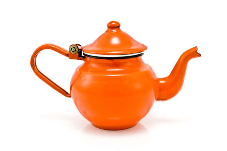 Old red rustic tea pot isolated on whiteの写真素材