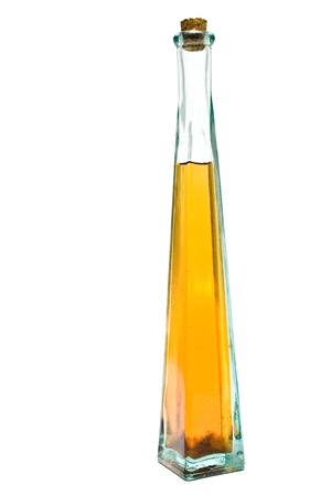 Long thin bottle of olive oil  isolated on white の写真素材