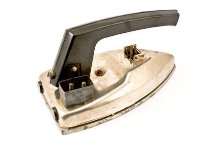  Old electric iron isolated on whiteの写真素材