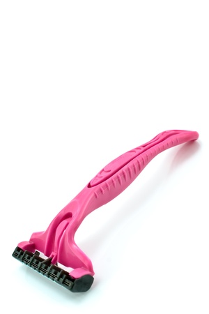 Red razor blade isolated on whiteの写真素材