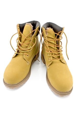 New yellow boots isolated on whiteの写真素材