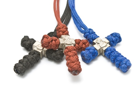 Three knitted christian crosses isolated on whiteの写真素材
