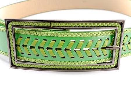 Buckle on women's leather belt  on whiteの写真素材