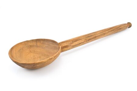 Large wooden spoon isolated on white の写真素材