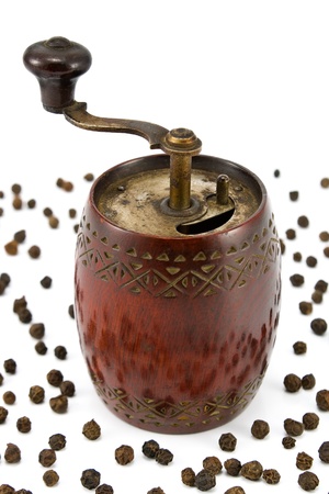 Old pepper mill isolated on whiteの写真素材