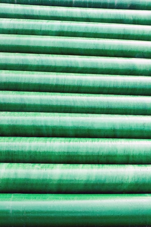 Texture of green plastic pipe as backgroundの写真素材