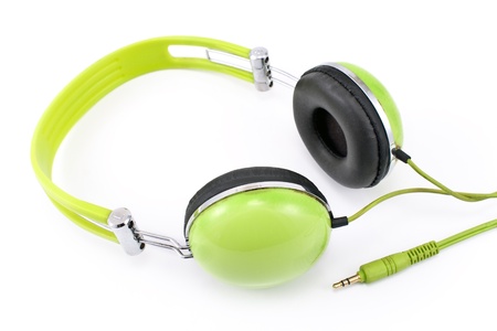 Green headphones isolated on white backgroundの写真素材