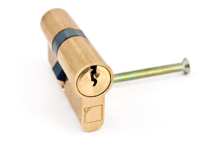 Brass cartridge cylinder isolated on whiteの写真素材