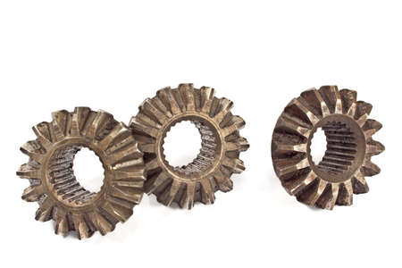 Old metal cogs isolated on white