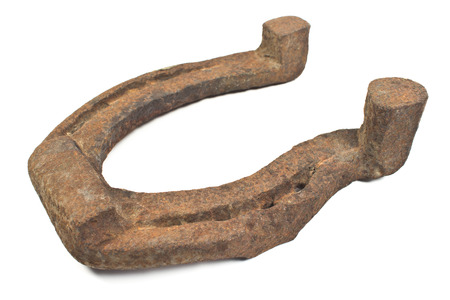 Old rusty horseshoe isolated on white の写真素材