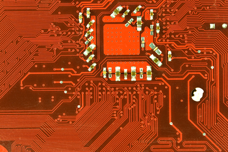 Close up of red computer circuit board