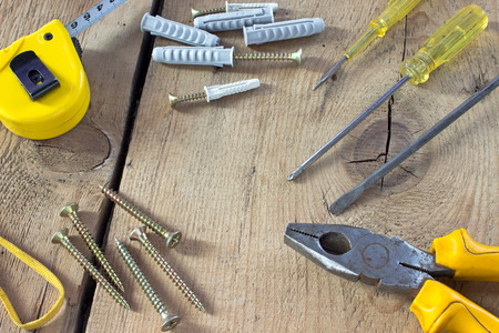 Tools on wooden background