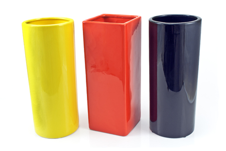 Three colorful ceramic  vases isolated on whiteの写真素材