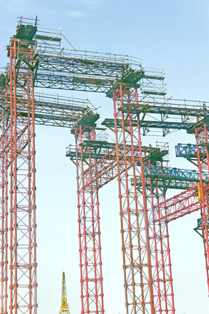 Bridge construction over blue skyの写真素材
