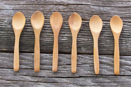 Wooden spoons on wooden backgroundの写真素材