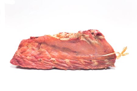 Smoked pork bone with meat isolated on whiteの写真素材