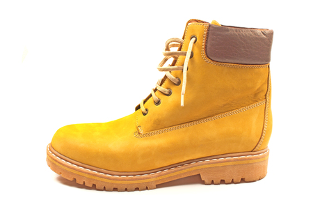 New yellow winter boot isolated on whiteの写真素材
