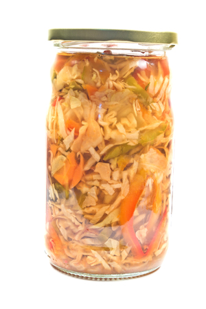 Mixed cut vegetable in vinegar and jar isolated on whiteの写真素材